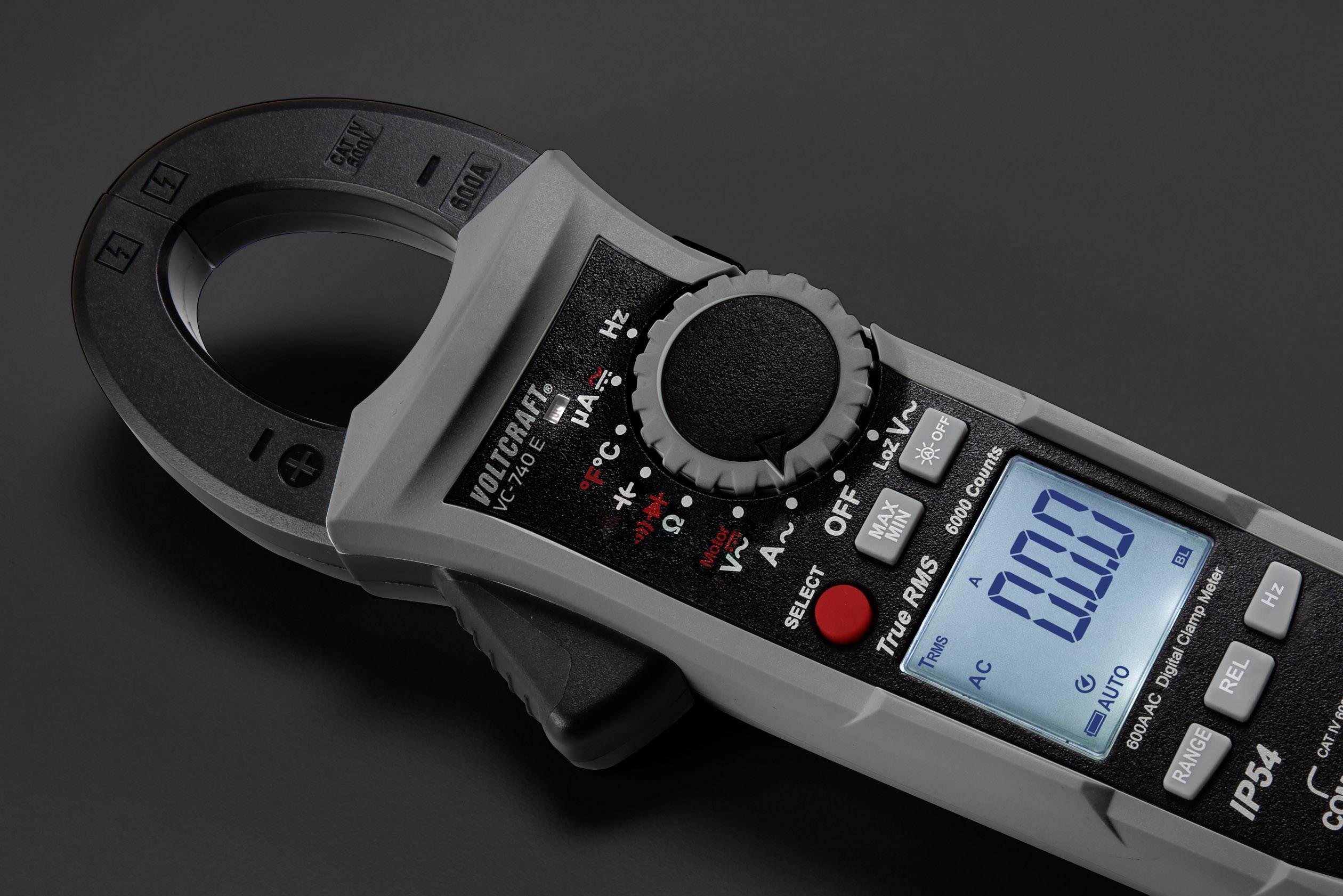 Digital clamp multimeter with LCD display showing '0.0'. Measurement options: AC, DC, and resistance. Tool for electrical measurements.
