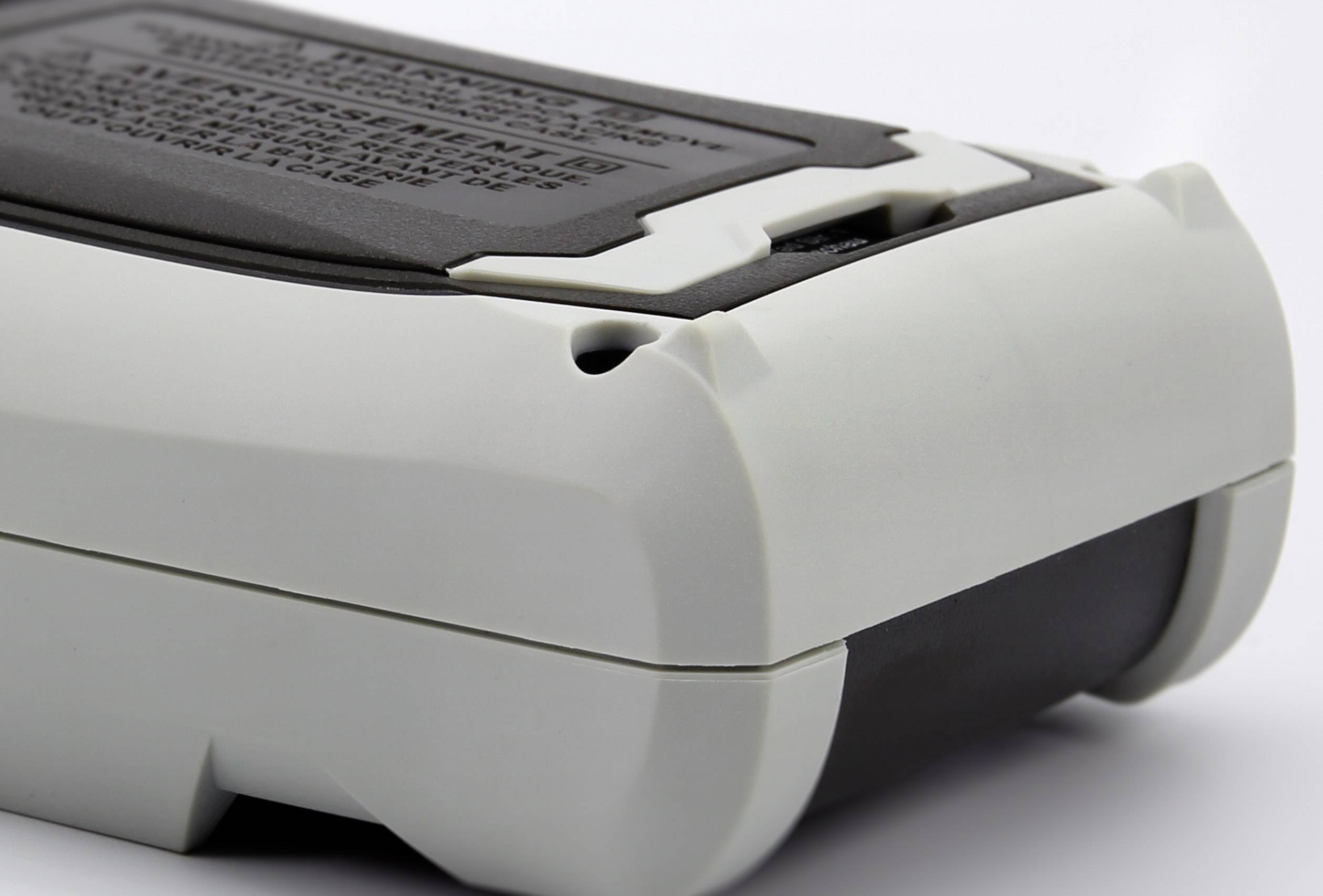 Recording device with a grey and black casing, potentially for data collection or measurements, displayed on a white background.