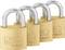 Four golden padlocks of the brand "Burg Wächter C-line" are lined up in a row. They shine and have silver shackles.