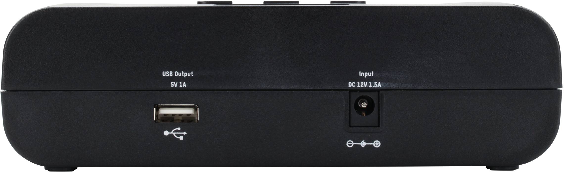 Rear view of a black device with a USB port, power connection (DC IN 3A), and power supply symbols.