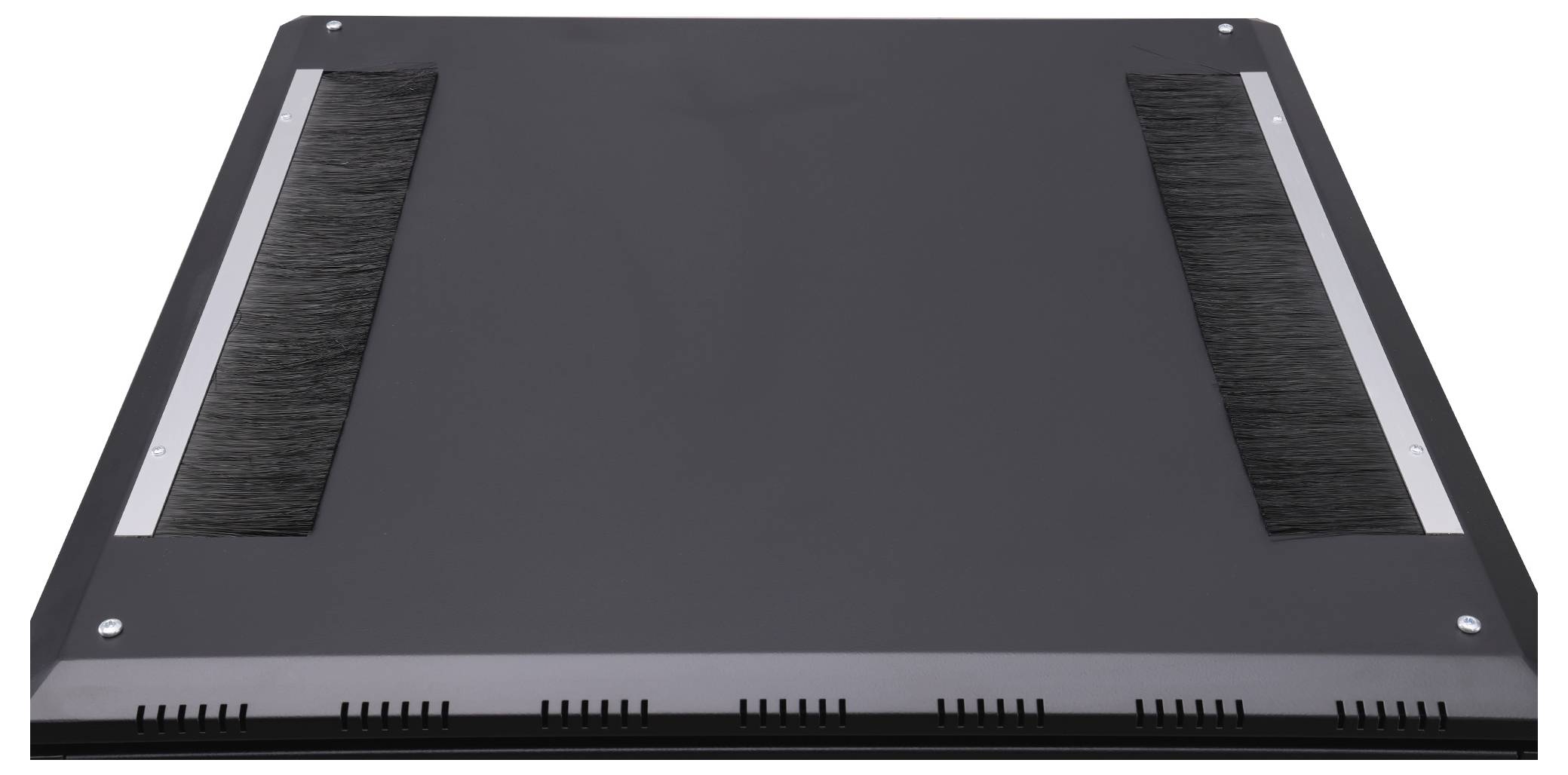 A black cover with two long, horizontal brush stripes along the edges, lying on a flat surface.