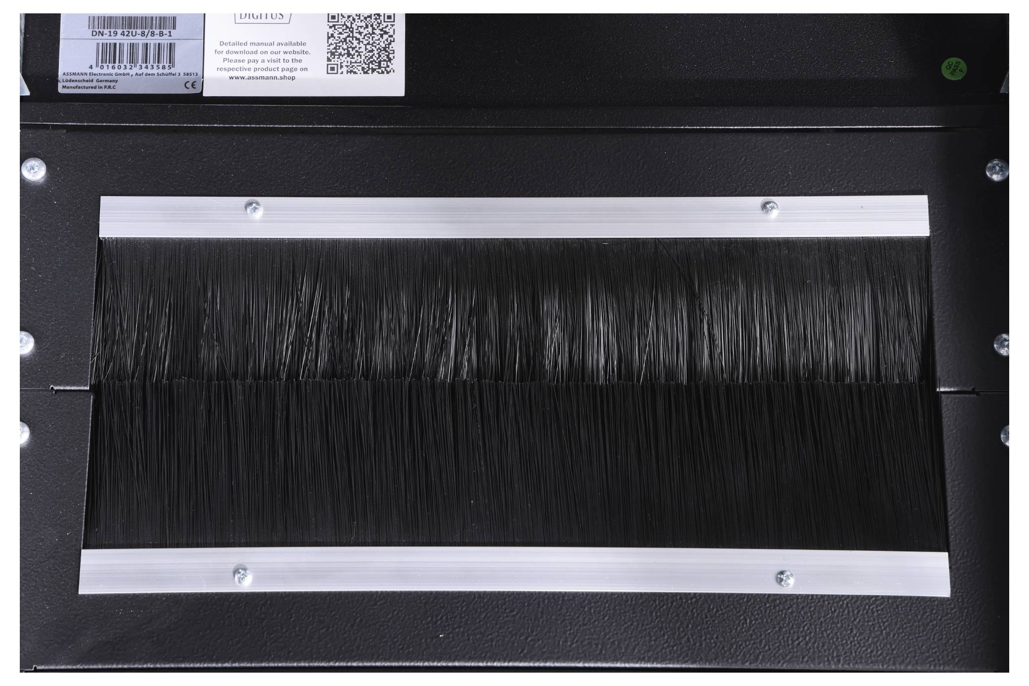 'Closure of a dust-proof box with a black brush seal and metal trim.'