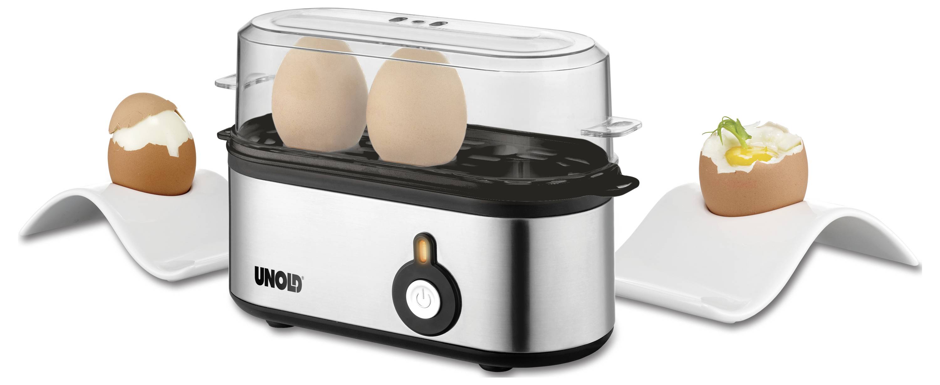 An egg cooker with two boiled eggs inside. Two egg holders on either side each contain a half-shelled egg, one partially eaten.
