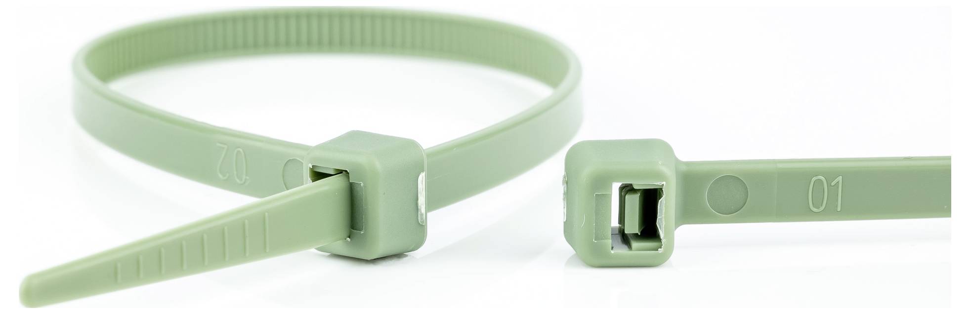 Two green cable ties, one looped and one open, showcasing the fastening mechanism.