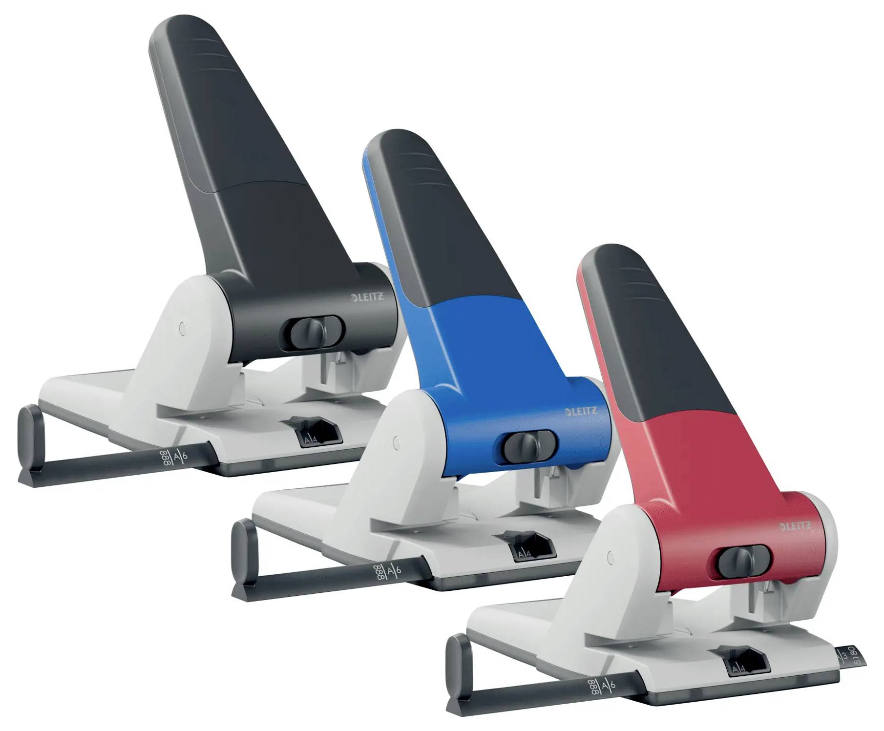 Three angled staplers in black, blue, and red on a white surface, showcasing their sleek design and variety in color.