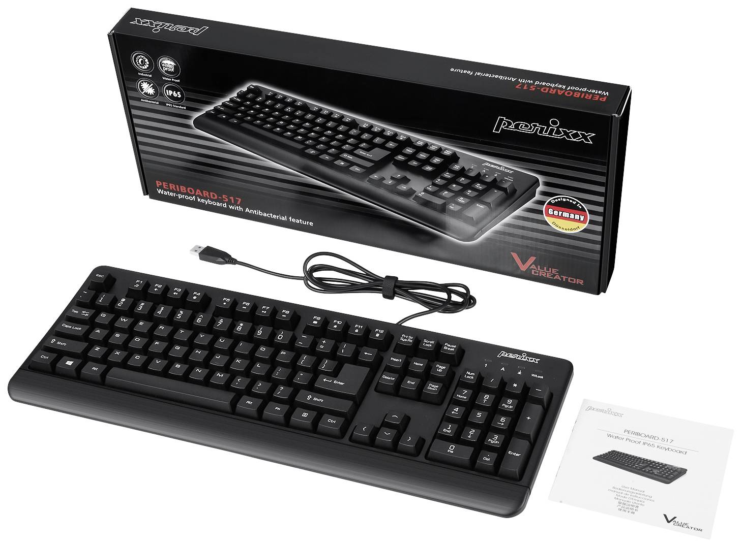 Black wired keyboard in front of packaging and manual, with antibacterial protection, suitable for professional users.