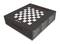 Black box with chessboard pattern and the print 'ChessGenius Exclusive'. Packaging for a chess set.