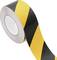 A roll of caution tape with alternating black and yellow diagonal stripes, used for marking hazards or restricted areas.