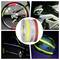 Reflective safety tape roll shown with examples on bicycle wheels, a motorcycle, and cars, highlighting visibility marking in the dark.