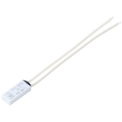 A white electrical capacitor with two long connecting wires is lying on a white surface.