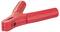 Red plastic clamp element, commonly used as a battery terminal for jump leads, on a white background.