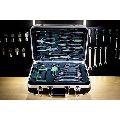 A professional tool case open on a workbench, displaying various hand tools including pliers, screwdrivers, and wrenches, all neatly organized.