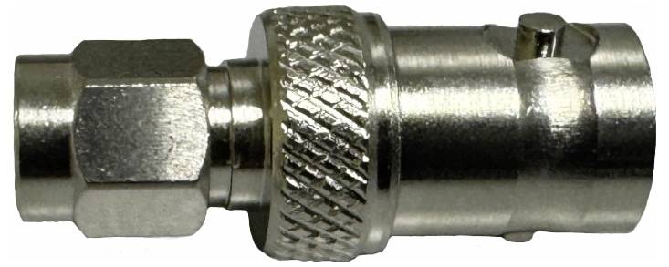 A silver coaxial plug with a ribbed surface and screw-on connection, typical of aerial connections.
