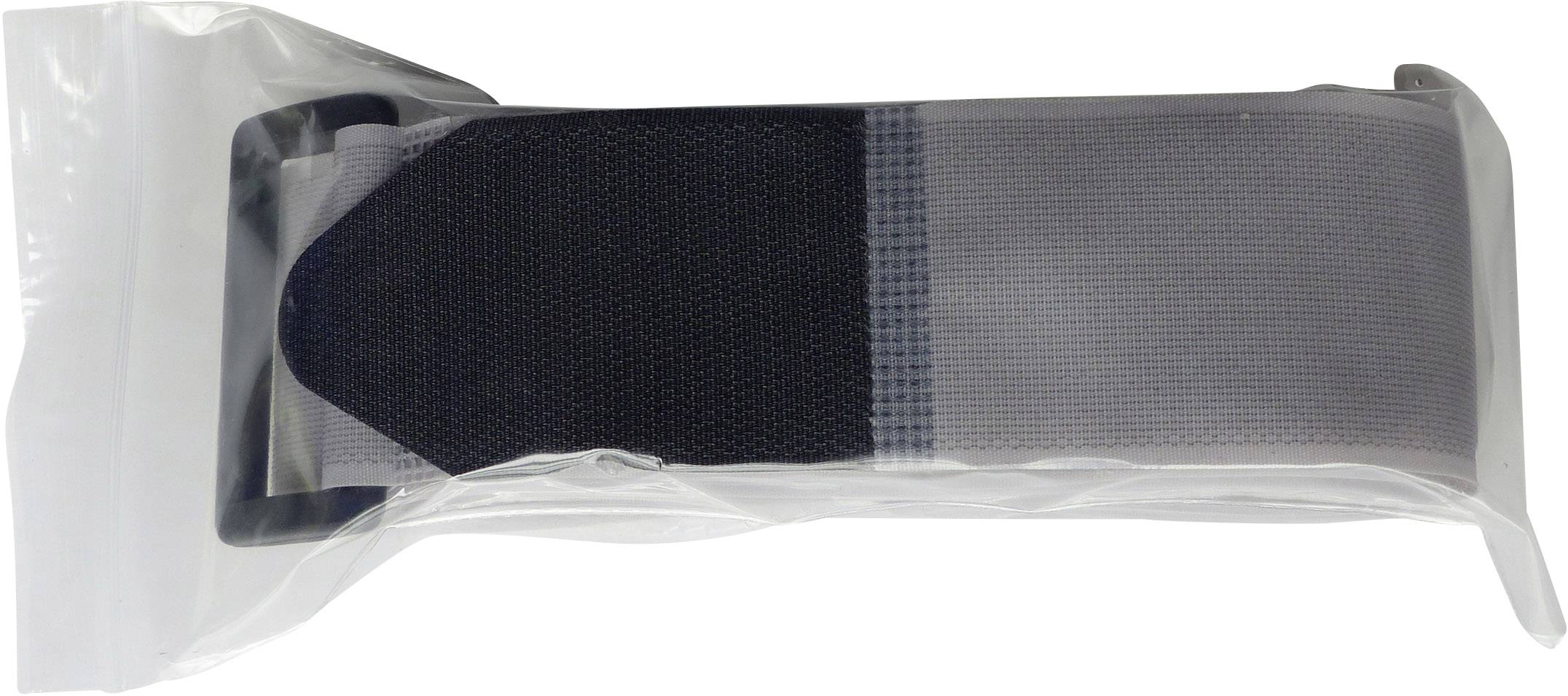 'A belt or strap in a plastic packaging, lying on a table.'