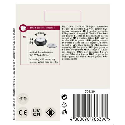 'Product packaging with guarantee information in multiple languages, battery symbols and required certificates, barcode visible.'