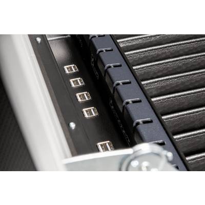 Close-up of USB ports on a computer case. The ports are built into a metal frame, part of the IT infrastructure.