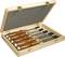 Wooden box with an open lid displays five wood chisels with wooden handles and metal blades, neatly arranged side by side.