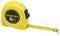 Yellow Stanley tape measure, 5 metres long, partially unrolled.