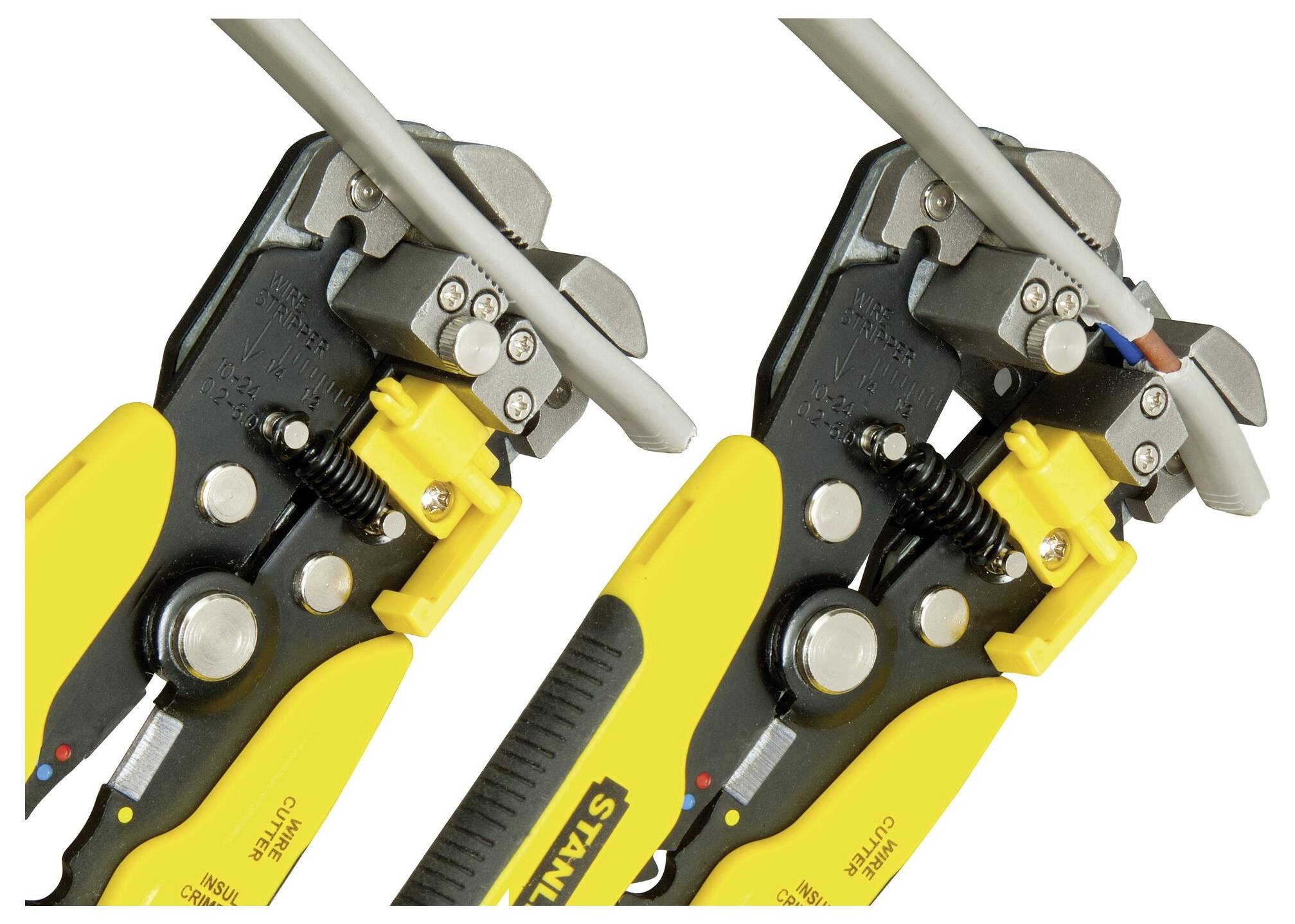 Two yellow wire strippers firmly grip a grey cable.