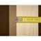 A yellow tape measure is measuring the width of a wooden beam and shows approximately 3 centimetres.