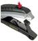 A black Stanley stapler, partially opened, shows the insertion point for staples. A red arrow points to a button.