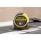 'Stanley Fatmax 8m measuring tape' lying on a table, in close-up.
