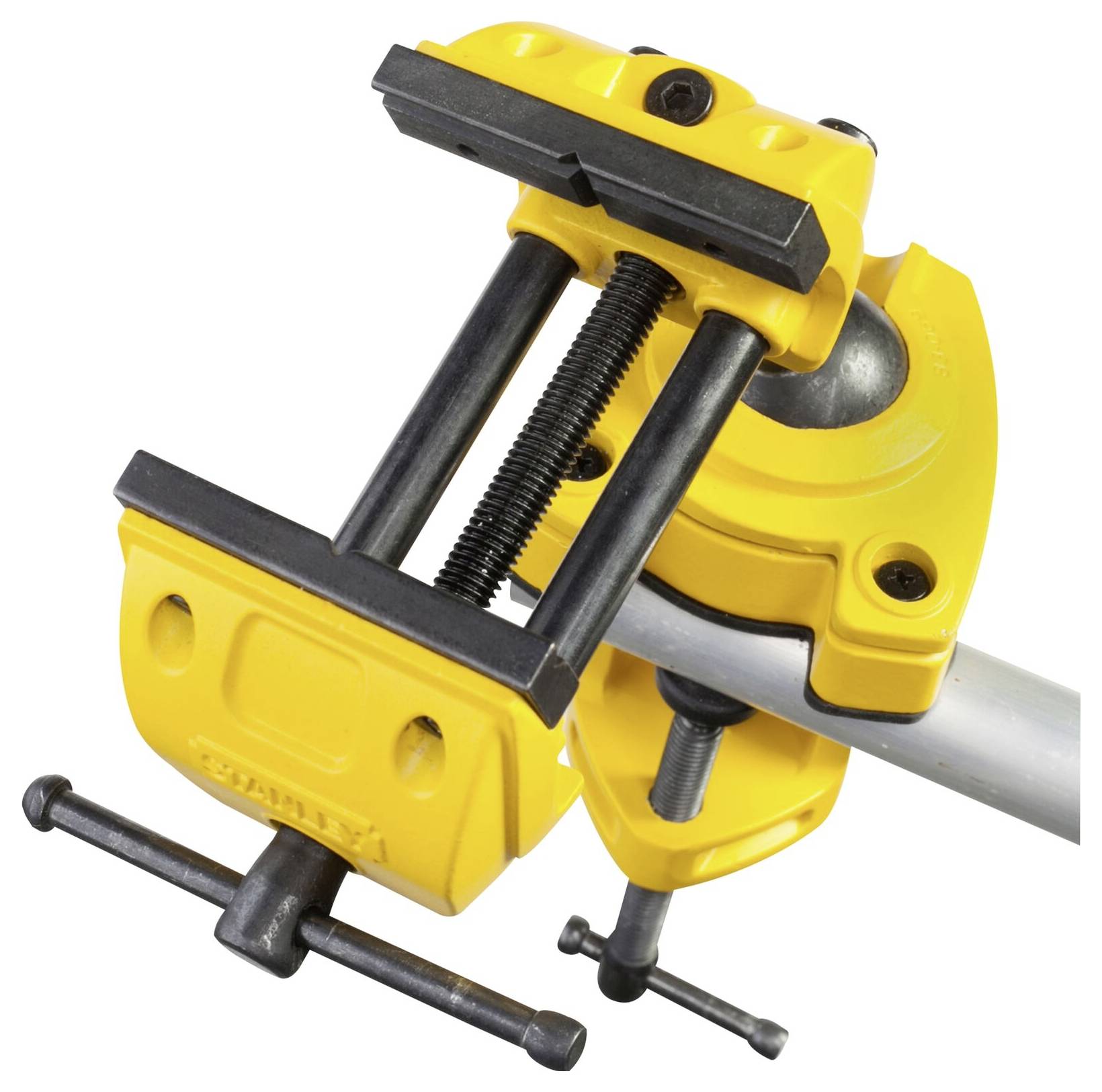 A yellow pipe clamp is attached to a metal pipe. The clamp has black rubber surfaces that securely grip the pipe.