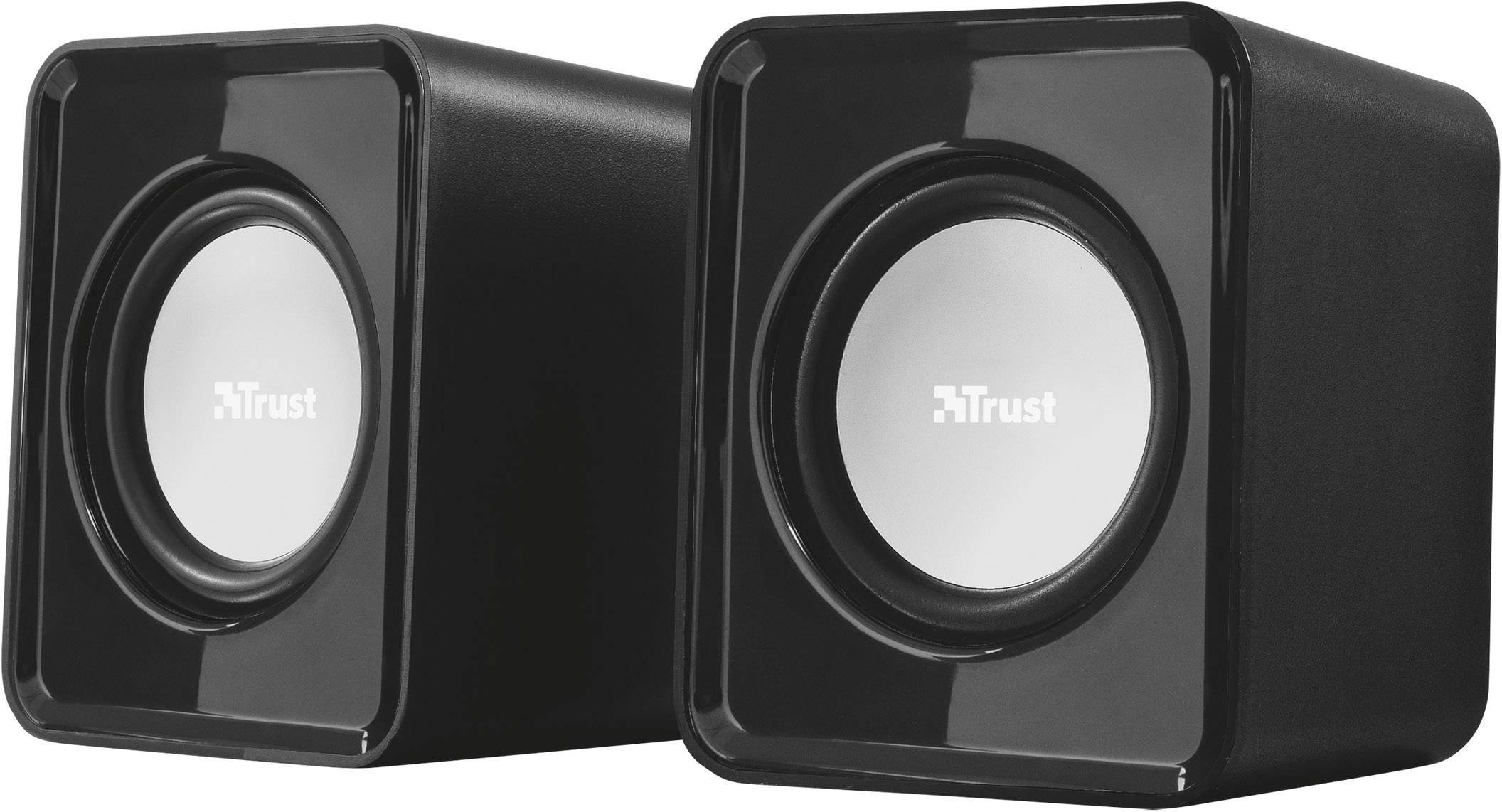 Two black speakers with silver accents by the brand Trust, standing side by side. Ideal for desktop computer use.