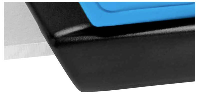 A piece of metal edge next to a black and blue plastic surface.