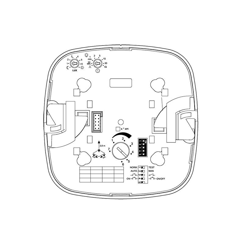 Diagram of a device with electrical connections and settings. Two rotary dials at the top, central connections, and switches in the bottom right.