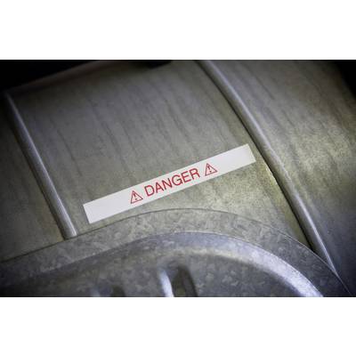 Warning sign with the text 'Danger' in red lettering mounted on a metallic surface.