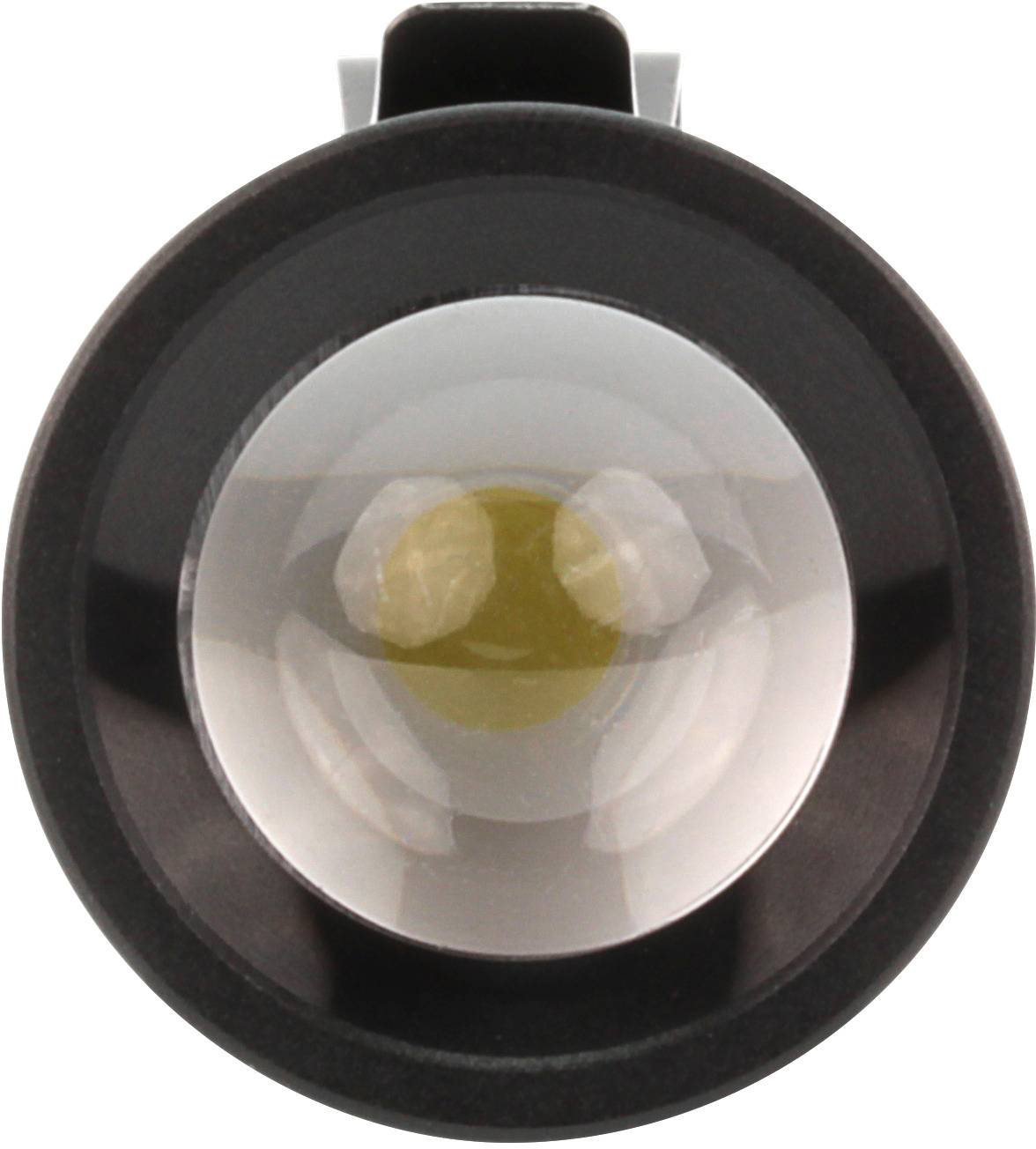 Close-up of a round, glass lens with a black border, suggesting optical magnification or focusing.