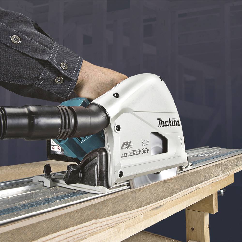 A person is operating a Makita circular saw on a wooden board.