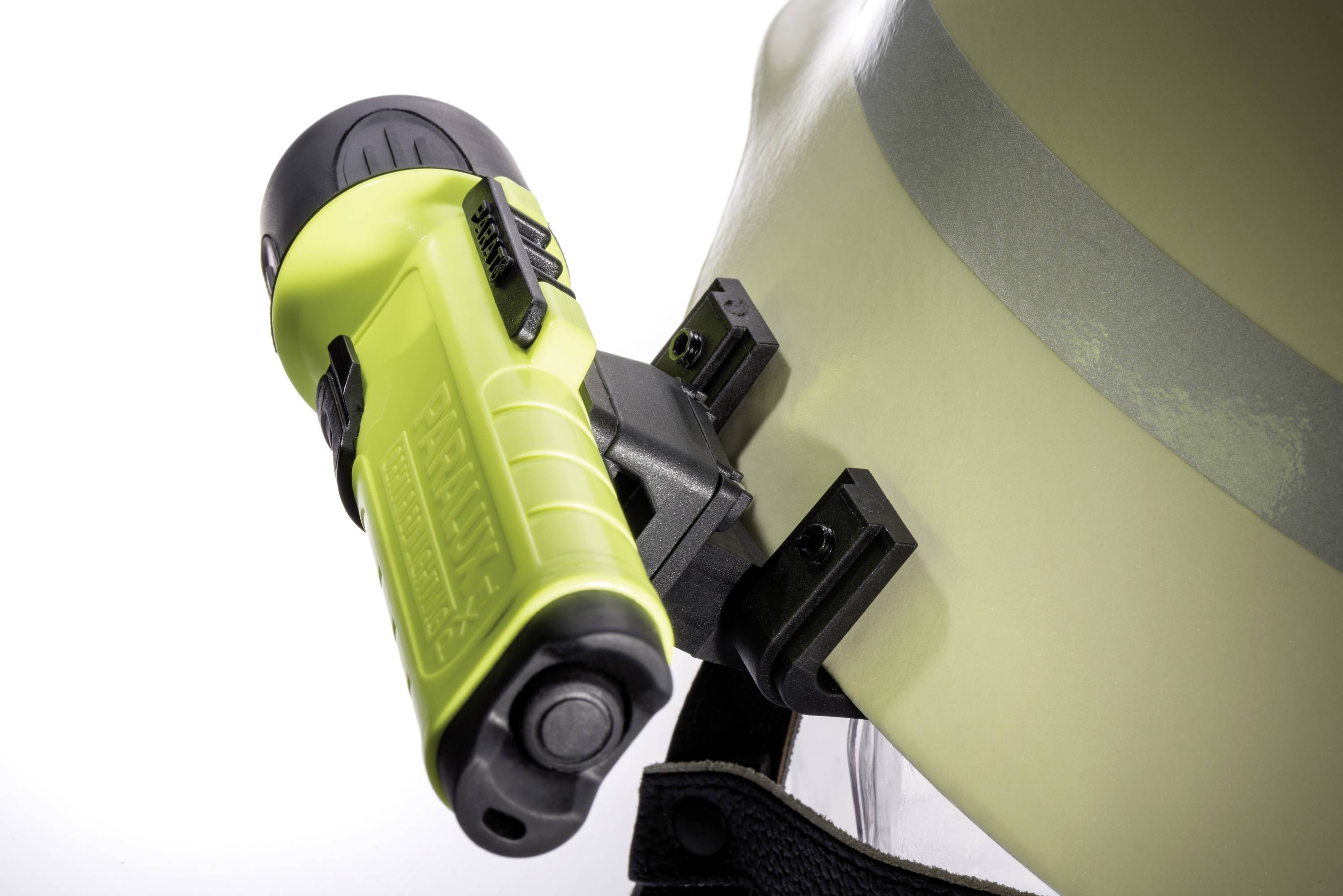 A green and black torch is mounted on a yellow hard hat.