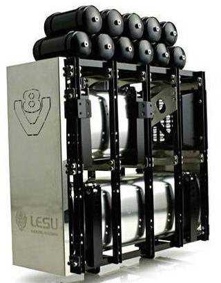 Metal device with reservoirs and eight large, black cylinders on top. 'LESU MODEL' logo and lettering visible on the side.