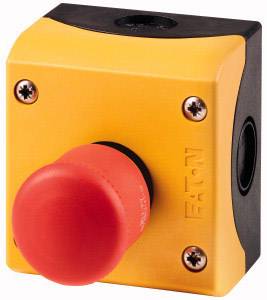 A red emergency stop button on a yellow housing. The button is used for rapid shutdown in emergency situations.
