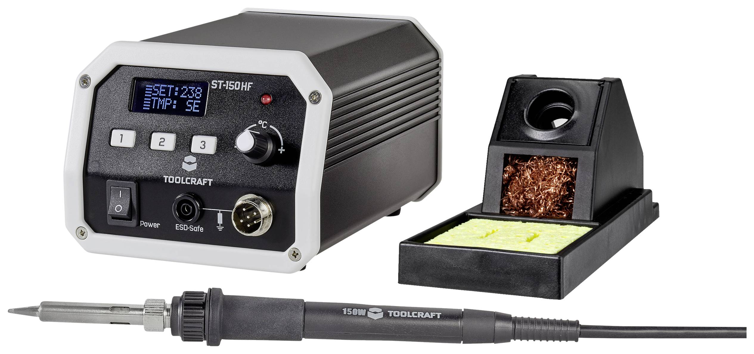 Soldering station with digital display, temperature control, soldering iron stand, and soldering sponge. Brand name 'Toolcraft' visible.