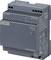 A gray industrial power supply unit labeled with 'SIEMENS Logo! Power'. It has input and output specifications printed on it.