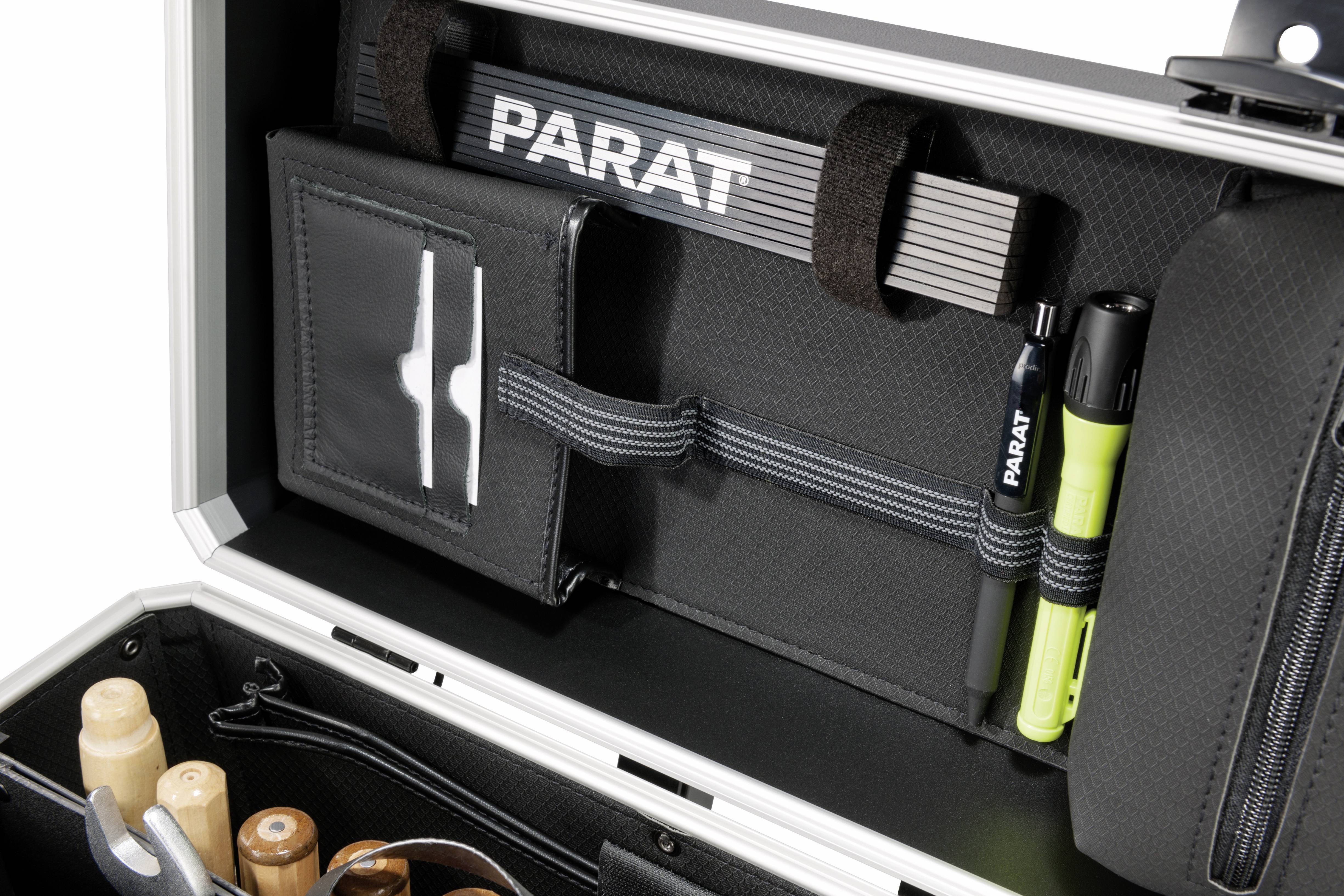 An open toolbox reveals various compartments and tools, including pencils, rubber bands, and wooden handles.