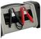 A gray jump starter machine with attached red and black alligator clamps used for charging car batteries.