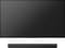 Flat-screen television with a black soundbar positioned underneath, against a white background.