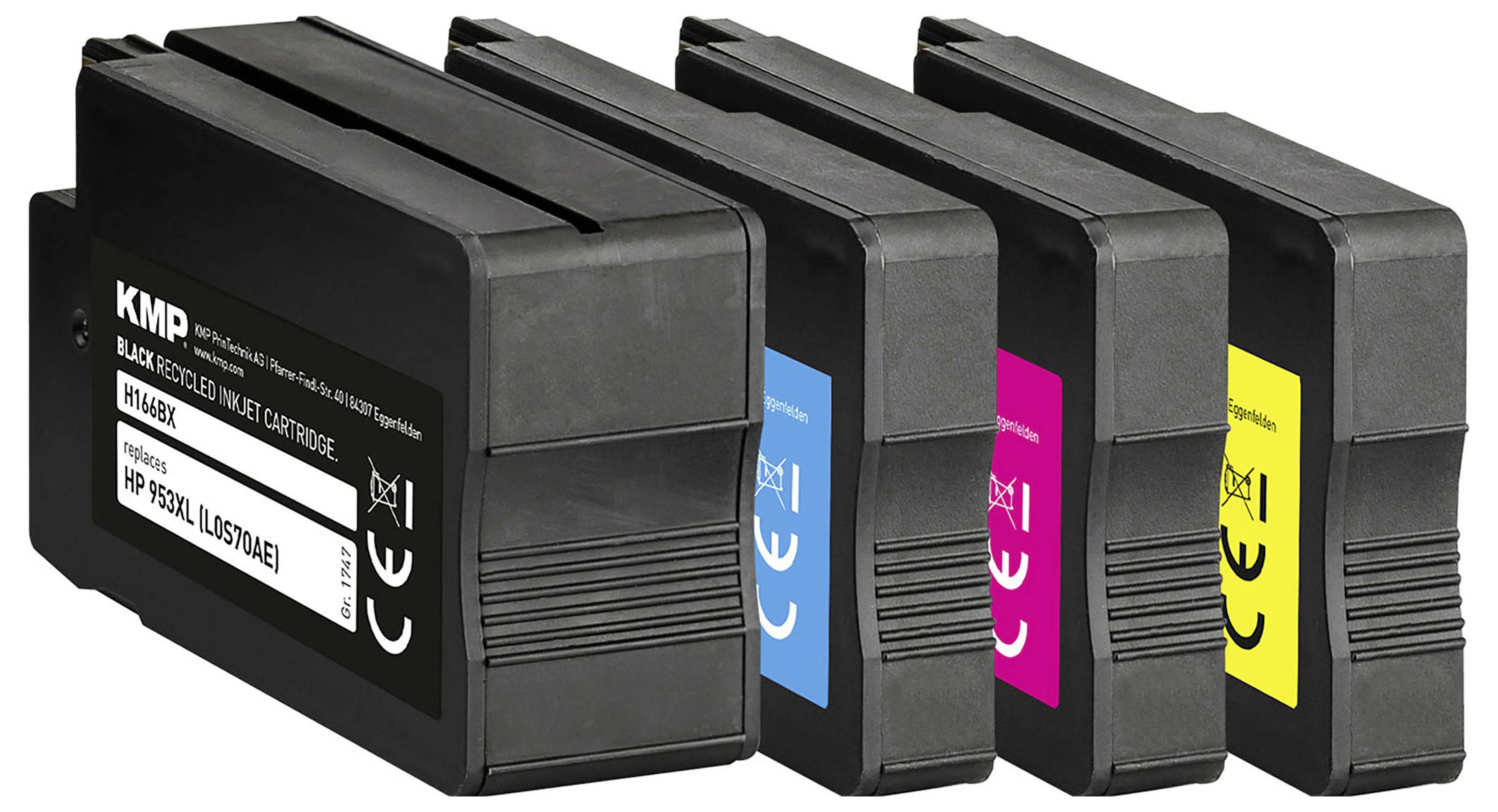 Four ink cartridges in black, cyan, magenta, and yellow are lined up, showcasing a color printing setup.