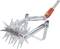 Hand garden tiller with a red and yellow handle and metal wheels with sharp tines, suitable for loosening soil in small garden beds.