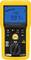 A yellow digital megohmmeter displaying '9.97 MΩ' on the screen. Various buttons and measurement options are visible.