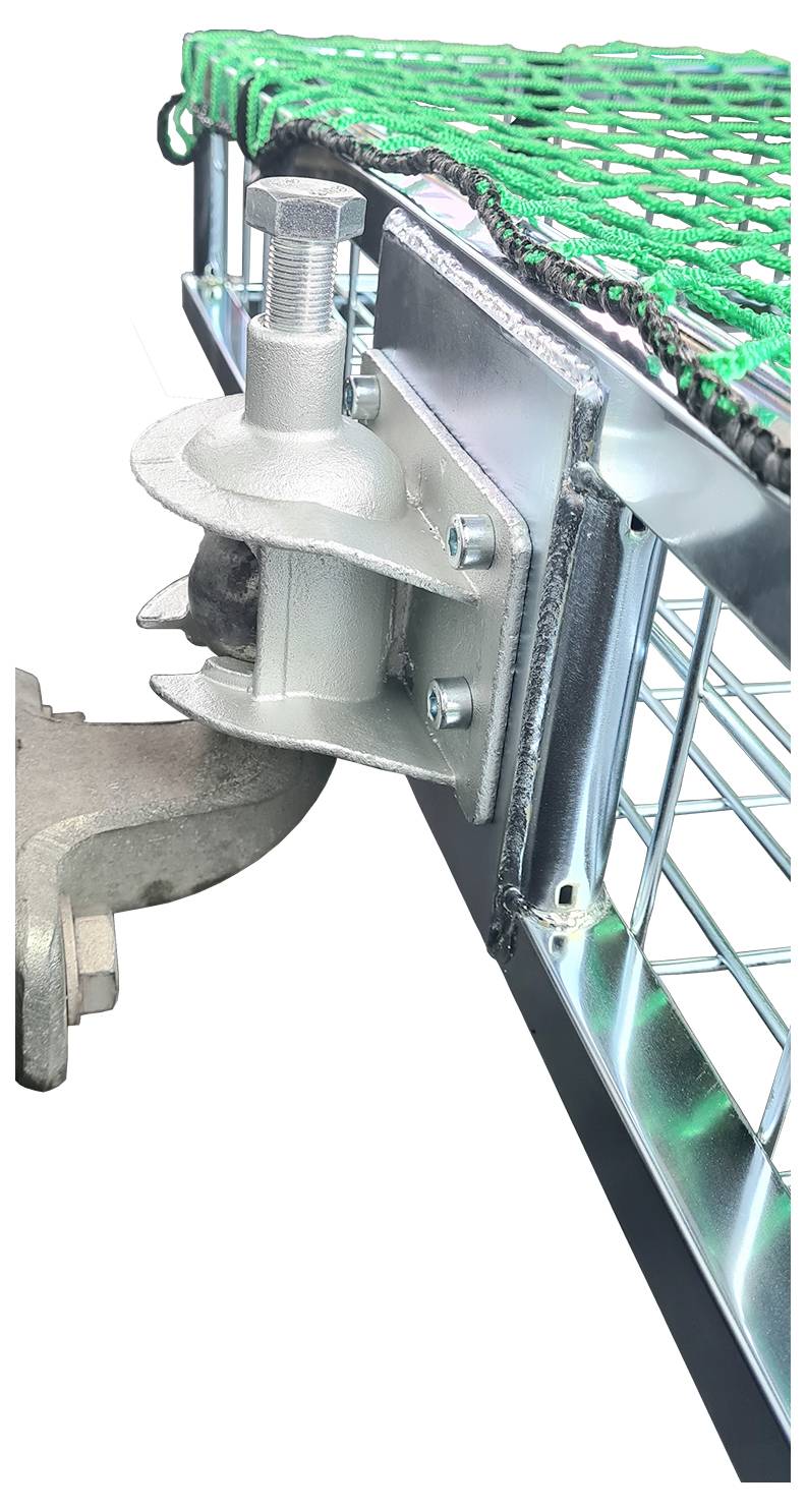 A metal component attaches a barrier to a clamp, secured by bolts, with green netting on top; used for safety or construction purposes.