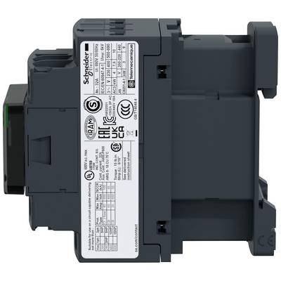A grey electrical contactor from Schneider Electric, with technical specifications visible on the label, viewed from the side.