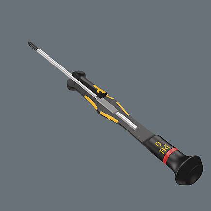 Electric screwdriver on a grey background. The device has a sleek design with a black and orange colour combination.