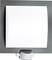 Motion sensor with a rectangular design, integrated white sensor, mounted against a dark background.