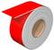 Red adhesive film on a roll, partially unrolled.