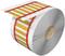 Large roll of silver-coloured material with white labels with yellow stripes laid upon it; labels are divided by red lines.